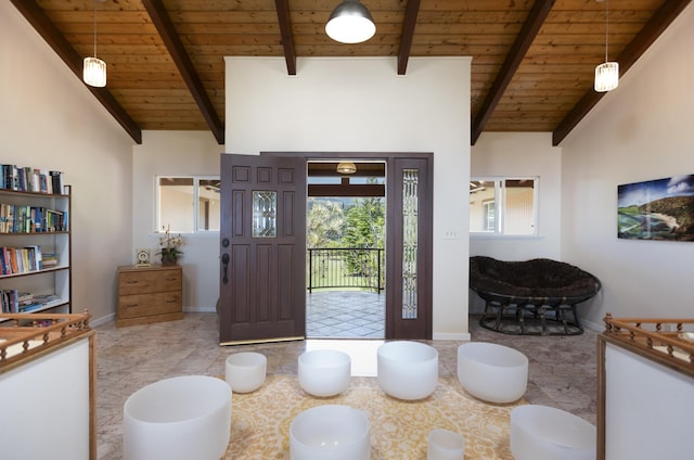 entryway featuring beamed ceiling, high vaulted ceiling, and wood ceiling