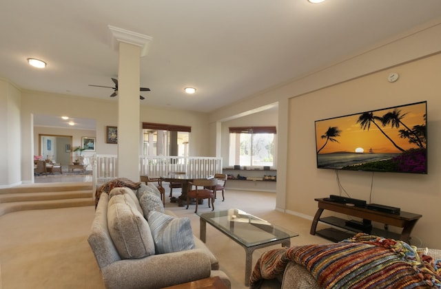 living room with ceiling fan and light colored carpet