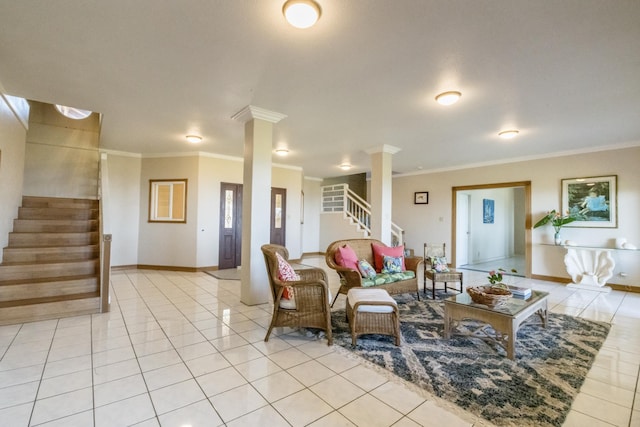 tiled living room featuring ornate columns and crown molding