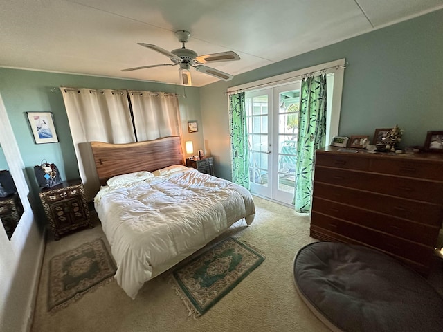 bedroom featuring access to outside, french doors, ceiling fan, and carpet