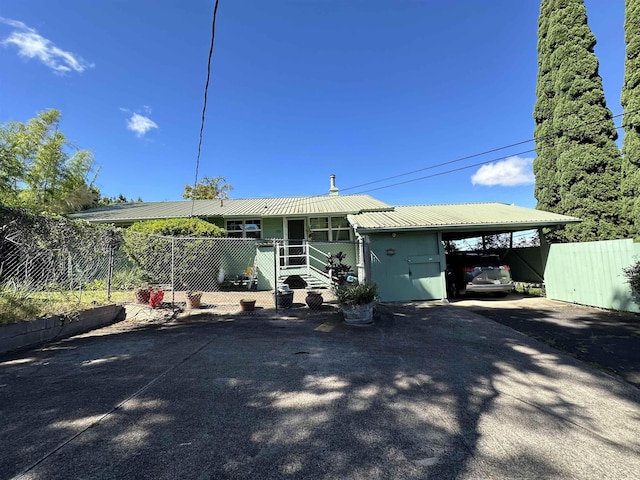 view of front of house with a carport