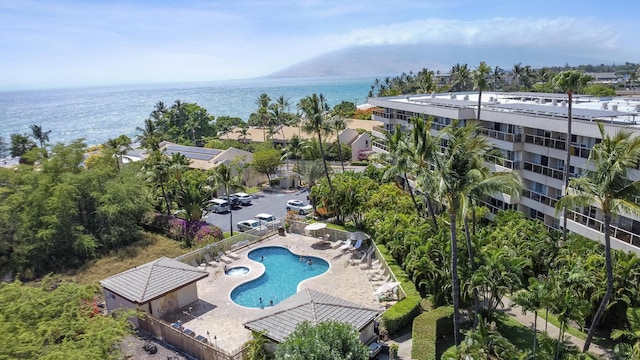 birds eye view of property featuring a water view