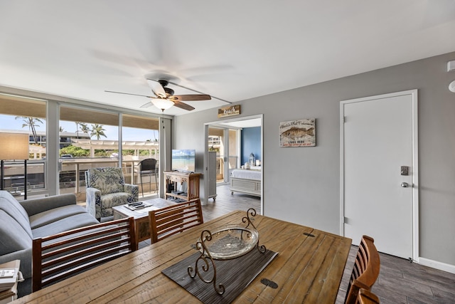 dining space featuring ceiling fan and hardwood / wood-style floors