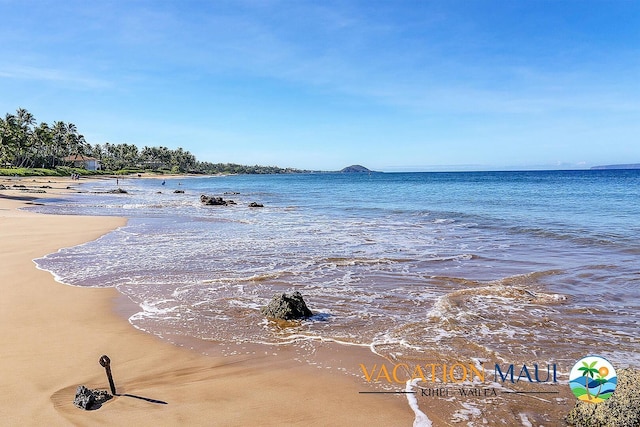 property view of water featuring a view of the beach