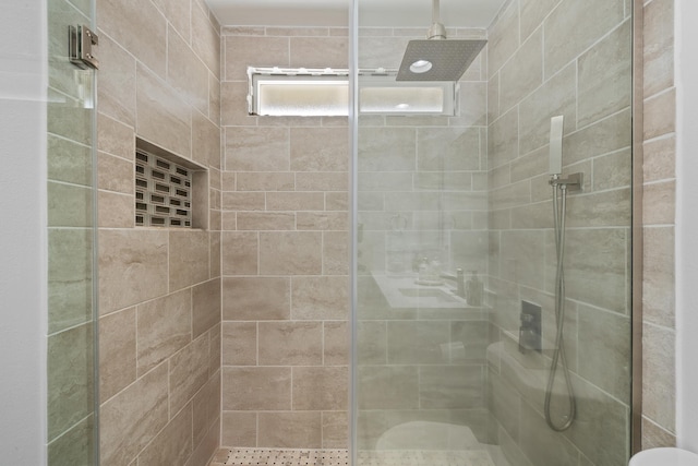 bathroom with a stall shower