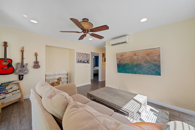 living area featuring recessed lighting, a wall mounted AC, and wood finished floors