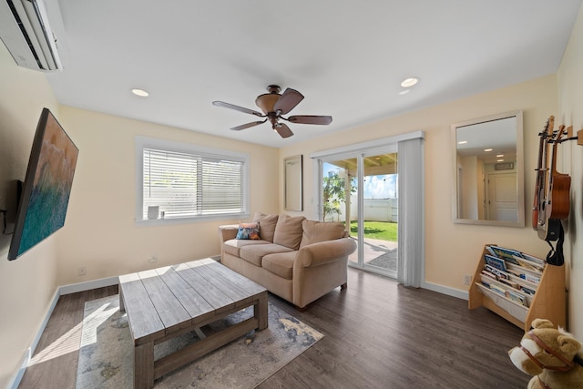 living room featuring recessed lighting, a ceiling fan, baseboards, and wood finished floors