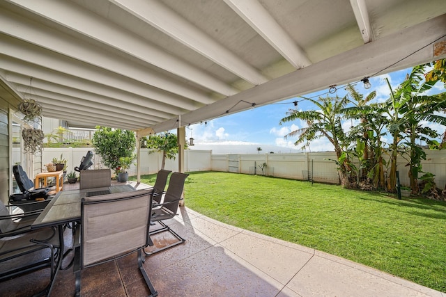 view of patio / terrace featuring outdoor dining area and a fenced backyard