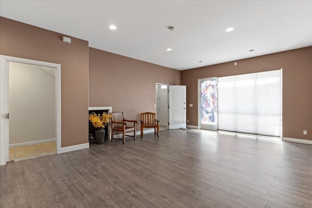 living area with wood-type flooring