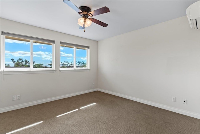 carpeted spare room with ceiling fan and a healthy amount of sunlight