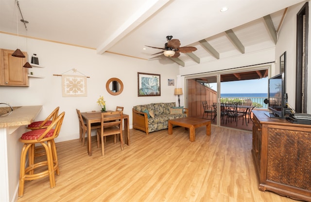 living room with light hardwood / wood-style floors, vaulted ceiling with beams, and ceiling fan