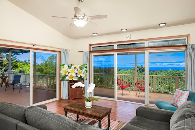 698 Kaupakalua Rd Unit A, Haiku, HI 96708 - living area featuring wood finished floors, vaulted ceiling, a ceiling fan, and recessed lighting