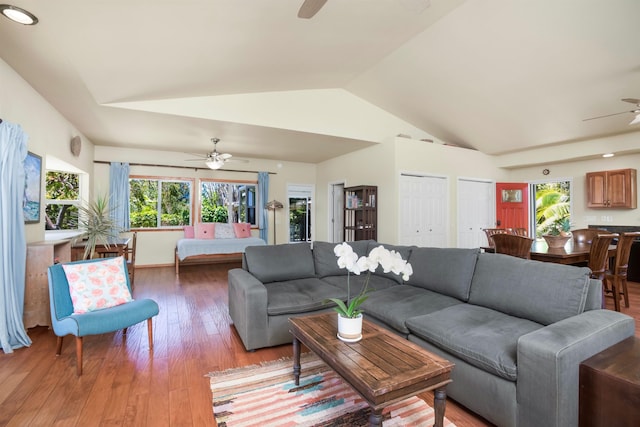 698 Kaupakalua Rd Unit A, Haiku, HI 96708 - living room with a ceiling fan, lofted ceiling, healthy amount of natural light, and light wood-style flooring