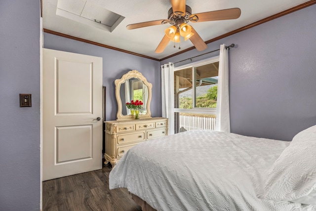 bedroom featuring ornamental molding, dark wood-type flooring, and ceiling fan