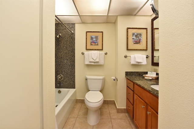 full bathroom with tile patterned floors, shower / bath combination, toilet, a paneled ceiling, and vanity