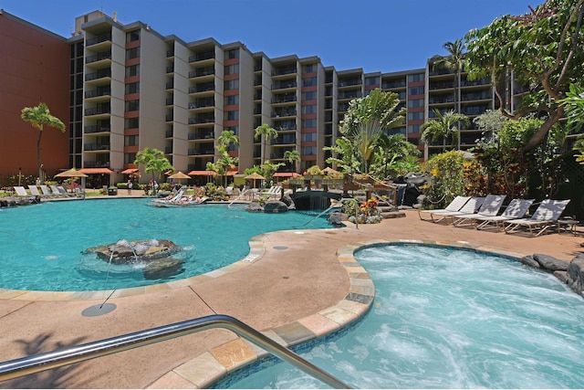 view of pool featuring pool water feature