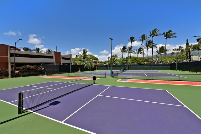 view of tennis court featuring basketball court