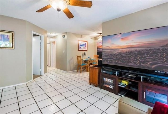 tiled living room featuring ceiling fan