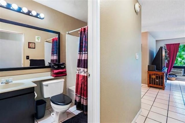 full bathroom with tile patterned flooring, vanity, toilet, and shower / bath combination with curtain