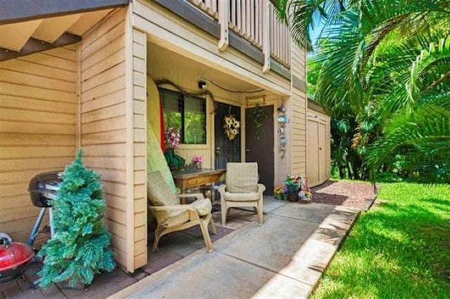 exterior space with a balcony and a patio area