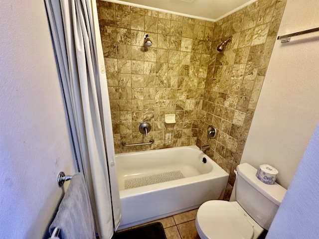 bathroom featuring shower / bath combo, tile patterned floors, and toilet