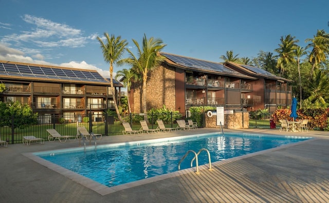 view of swimming pool with a patio area