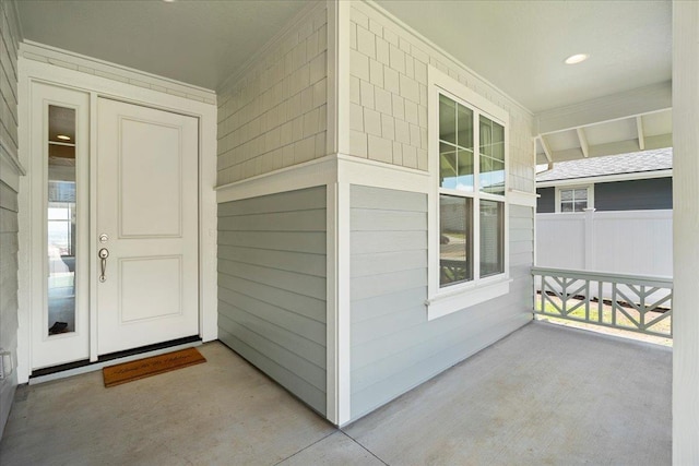 entrance to property with a porch