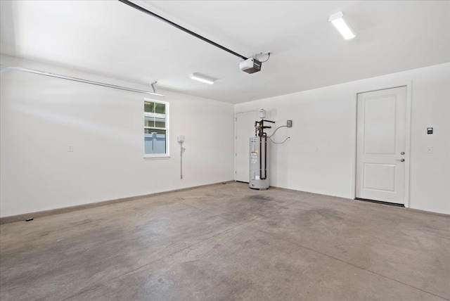 garage with water heater and a garage door opener