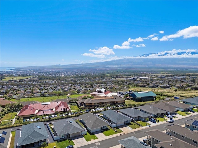 birds eye view of property featuring a mountain view and a residential view