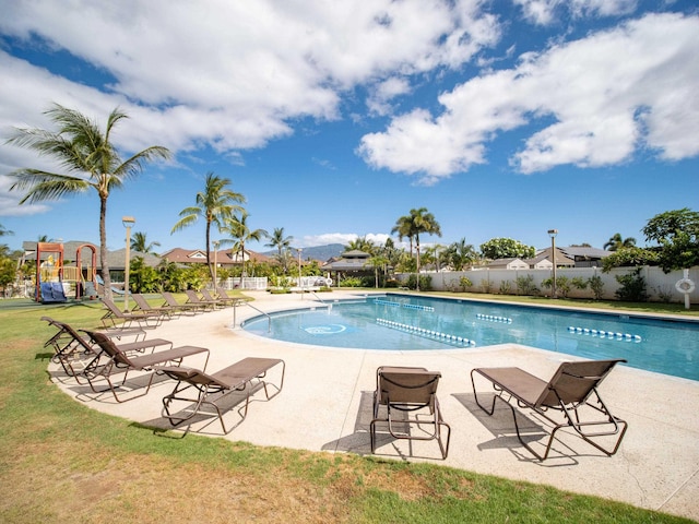 view of pool featuring a gazebo, a playground, a yard, and a patio