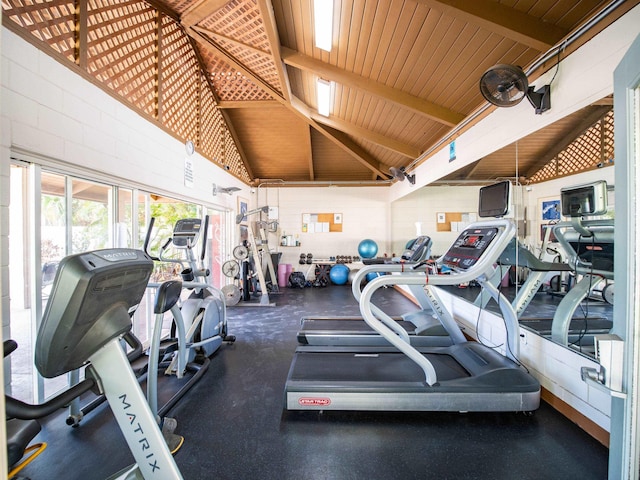 workout area featuring wooden ceiling and vaulted ceiling