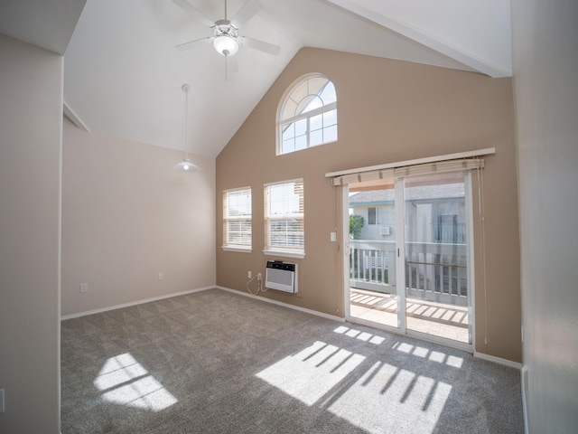 unfurnished living room with ceiling fan, high vaulted ceiling, carpet flooring, and an AC wall unit