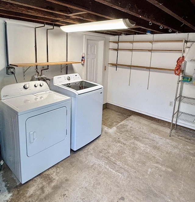 laundry area featuring laundry area and separate washer and dryer