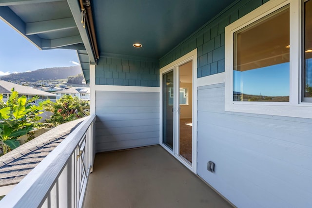 balcony featuring a mountain view