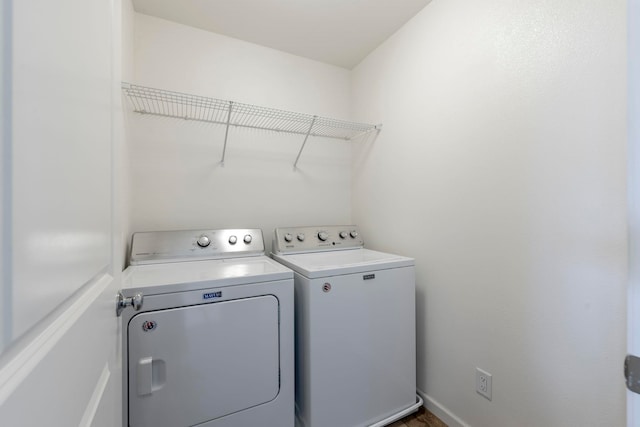 washroom featuring independent washer and dryer