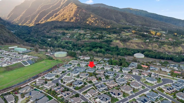 birds eye view of property featuring a mountain view