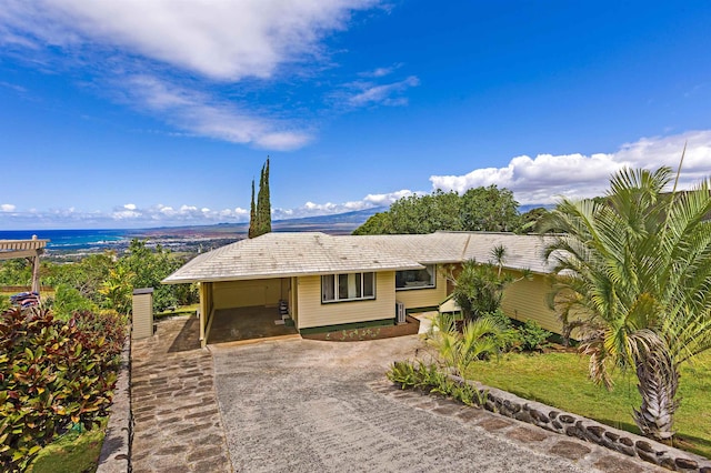 219 Ekoa Pl, Wailuku, HI 96763 - ranch-style home featuring driveway