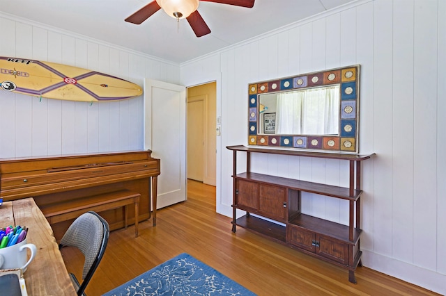 219 Ekoa Pl, Wailuku, HI 96763 - office area with wood finished floors, a ceiling fan, crown molding, and wood walls
