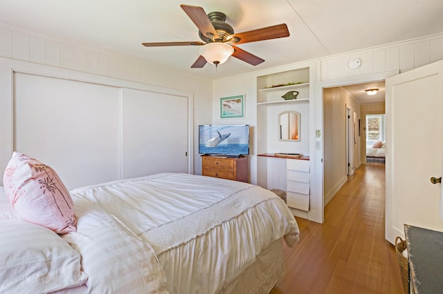 219 Ekoa Pl, Wailuku, HI 96763 - bedroom with wood-type flooring, a closet, and ceiling fan