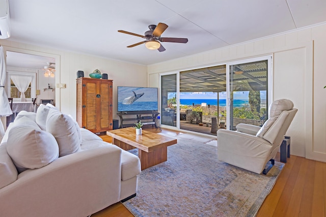 219 Ekoa Pl, Wailuku, HI 96763 - living area featuring a ceiling fan, wood finished floors, and ornamental molding