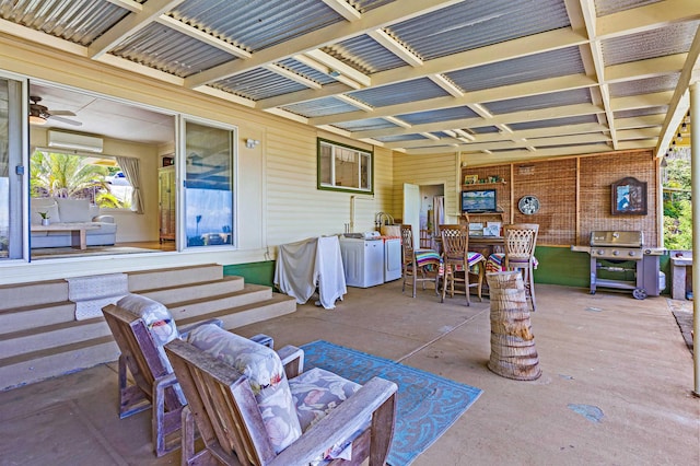 219 Ekoa Pl, Wailuku, HI 96763 - view of patio / terrace with grilling area and a wall unit AC