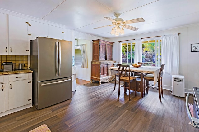 219 Ekoa Pl, Wailuku, HI 96763 - dining room with dark wood-style flooring and a ceiling fan