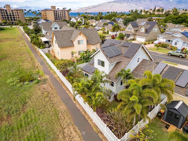 birds eye view of property with a mountain view