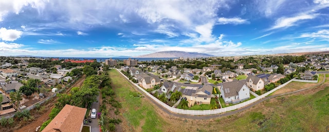 birds eye view of property featuring a mountain view