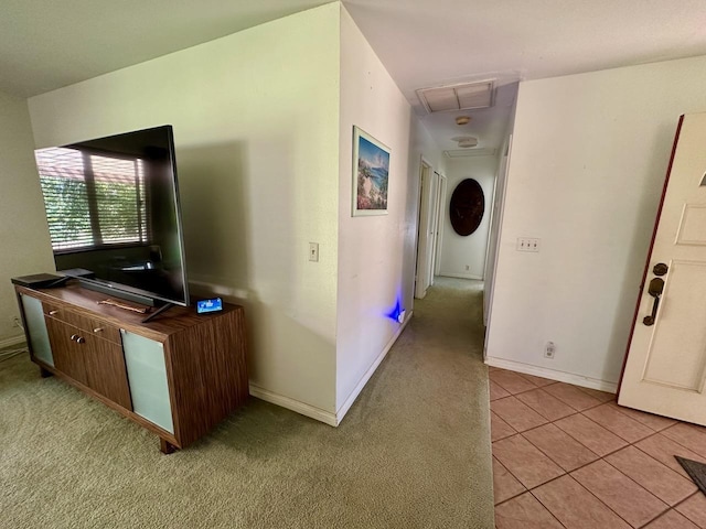 corridor with light colored carpet