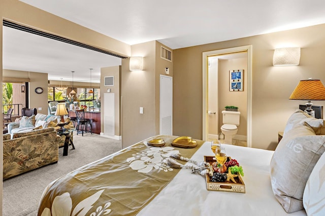 50 Nohea Kai Dr Unit 2-702, Lahaina, HI 96761 - bedroom featuring carpet flooring, multiple windows, and ensuite bathroom