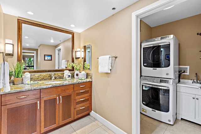 50 Nohea Kai Dr Unit 2-702, Lahaina, HI 96761 - bathroom featuring stacked washer / dryer, vanity, tile patterned floors, and recessed lighting