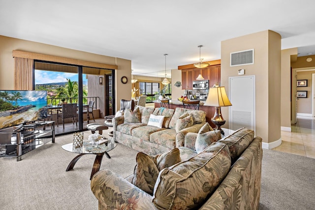 50 Nohea Kai Dr Unit 2-702, Lahaina, HI 96761 - living room with light colored carpet and baseboards