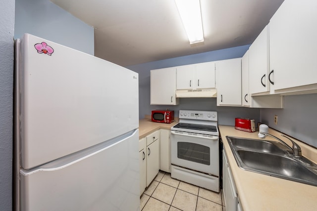 kitchen with white cabinetry, light tile patterned flooring, white appliances, and sink