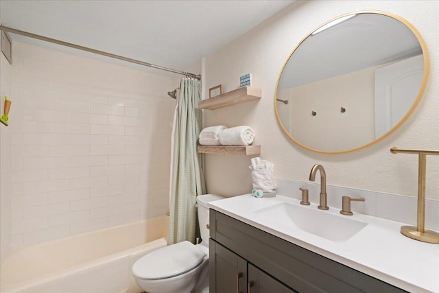 bathroom featuring toilet, shower / bath combination with curtain, and vanity
